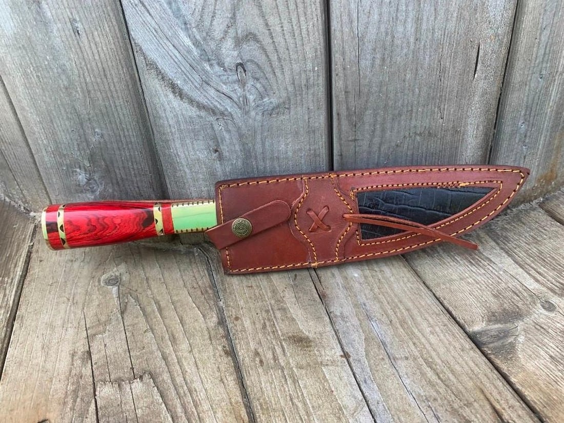 The Master's Damascus Chef's Knife 3: Custom Handmade Damascus Steel Hunting Chef Knife Handle Pakka Wood with steel spacer. Damascus Steel Blade with 256 Layers on it. HARDNESS 56-60 H R C VERY HIGH QUALITY GENUINE LEATHER SHEATH SIZE: O
