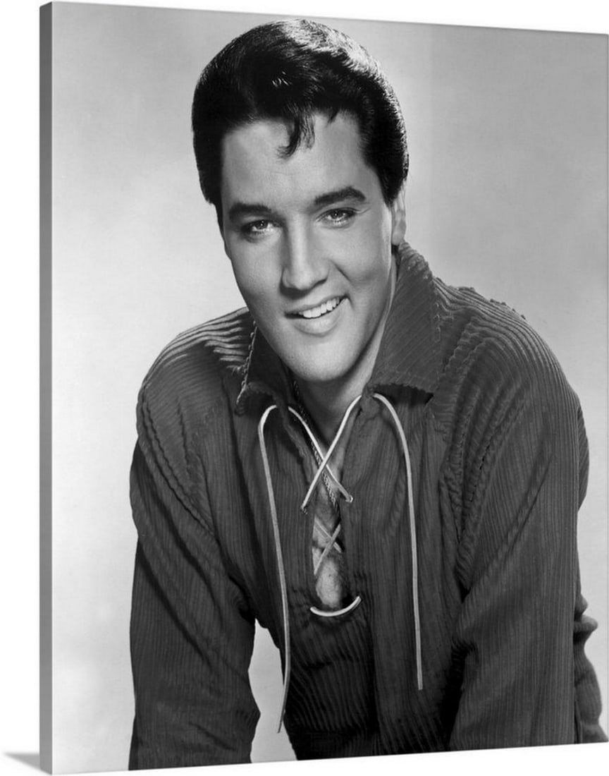 Elvis Presley in Clambake Canvas Reproduction - 20'' ? 24'': Elvis Presley in Clambake Canvas Reproduction - 20" ? 24" This canvas reproduction features a vintage publicity photo of Elvis Presley from the 1967 film Clambake. The image captures Elvis in 
