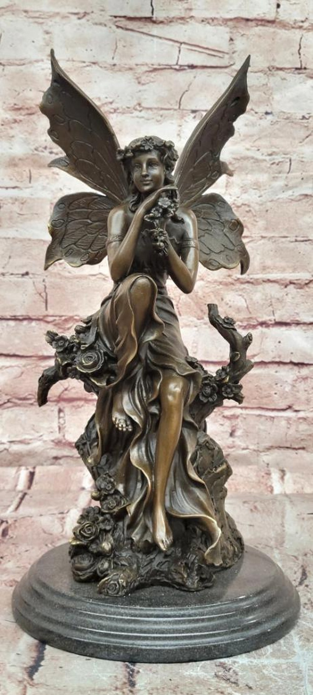 Wood Nymph Fairy Bronze Sculpture by Cesaro - 15'' x 7.5'': Wood Nymph Fairy Bronze Sculpture by Cesaro - 15" x 7.5" This bronze sculpture by Cesaro depicts a graceful wood nymph fairy with delicately sculpted wings and an elegant, flowing pose inspire
