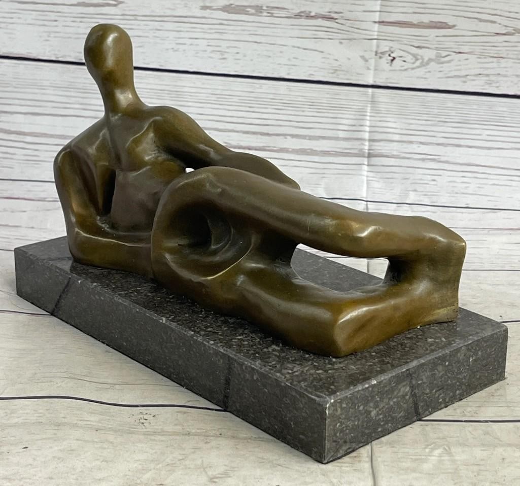 Modern Abstract Figure Bronze Sculpture: Modern Abstract Figure Bronze Sculpture True to the artist Henry Moore abstract and representational style, the woman is proportionally exaggerated, giving a defined plumpness to every part of her for