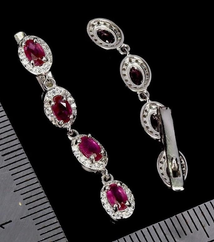 925 Sterling Silver Earrings Oval Ruby 5x3mm Natural Gemstone Jewelry: Up for auction is 925 Sterling Silver Earrings with Oval Ruby 5x3mm Natural Gemstones. Enjoy the way they shine in the light and feel more confident! Metal: Sterling Silver Base Metal: Sterling