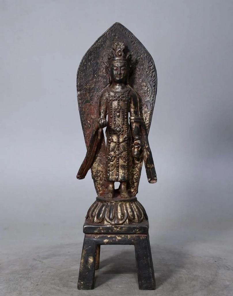 Pure Copper Northern Wei Guanyin Bodhisattva Statue: Pure Copper Northern Wei Guanyin Bodhisattva Statue This exquisite handmade statue depicts Guanyin Bodhisattva in the elegant Northern Wei style, showcasing the eras signature elongated forms and sere