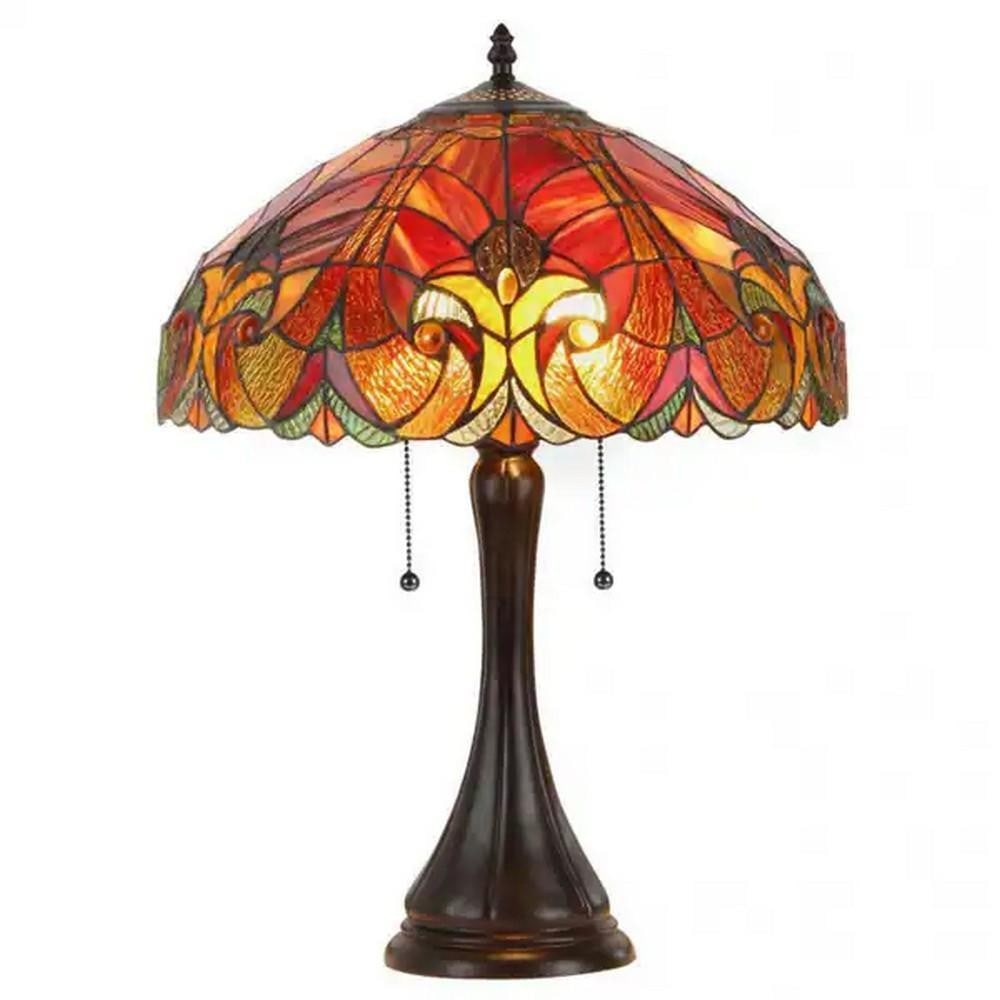 Sunset Tones Tiffany-Style Art Glass Table Lamp: Sunset Tones Tiffany-Style Art Glass Table Lamp Tiffany-style table lamp featuring an art glass shade composed of red, orange, and green tones arranged in an abstract stained glass pattern. The colorf