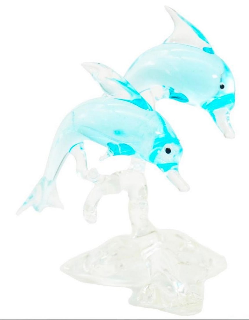 Dolphin Pair Murano Glass Figurine: Dolphin Pair Murano Glass Figurine The use of vibrant, translucent colors adds a touch of vibrancy and magic to the piece, reflecting the playful and energetic nature of these beloved sea creatures.