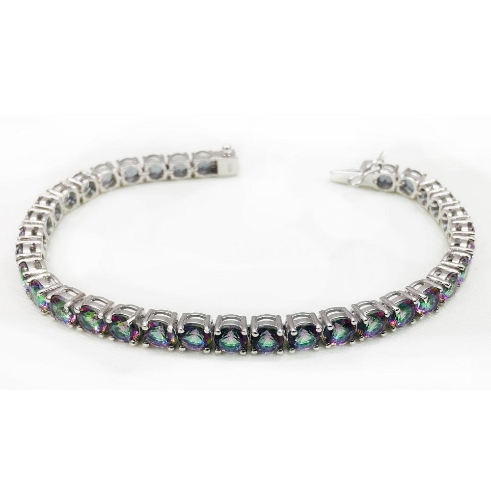 Mystic Quartz Studded Bracelet: Mystic Quartz Studded Bracelet Mystic quartz is a newer gem type, it is said to encourage trust, appreciation, and healing. This bracelet features round faceted stones. Size of Gemstones: 6mm View