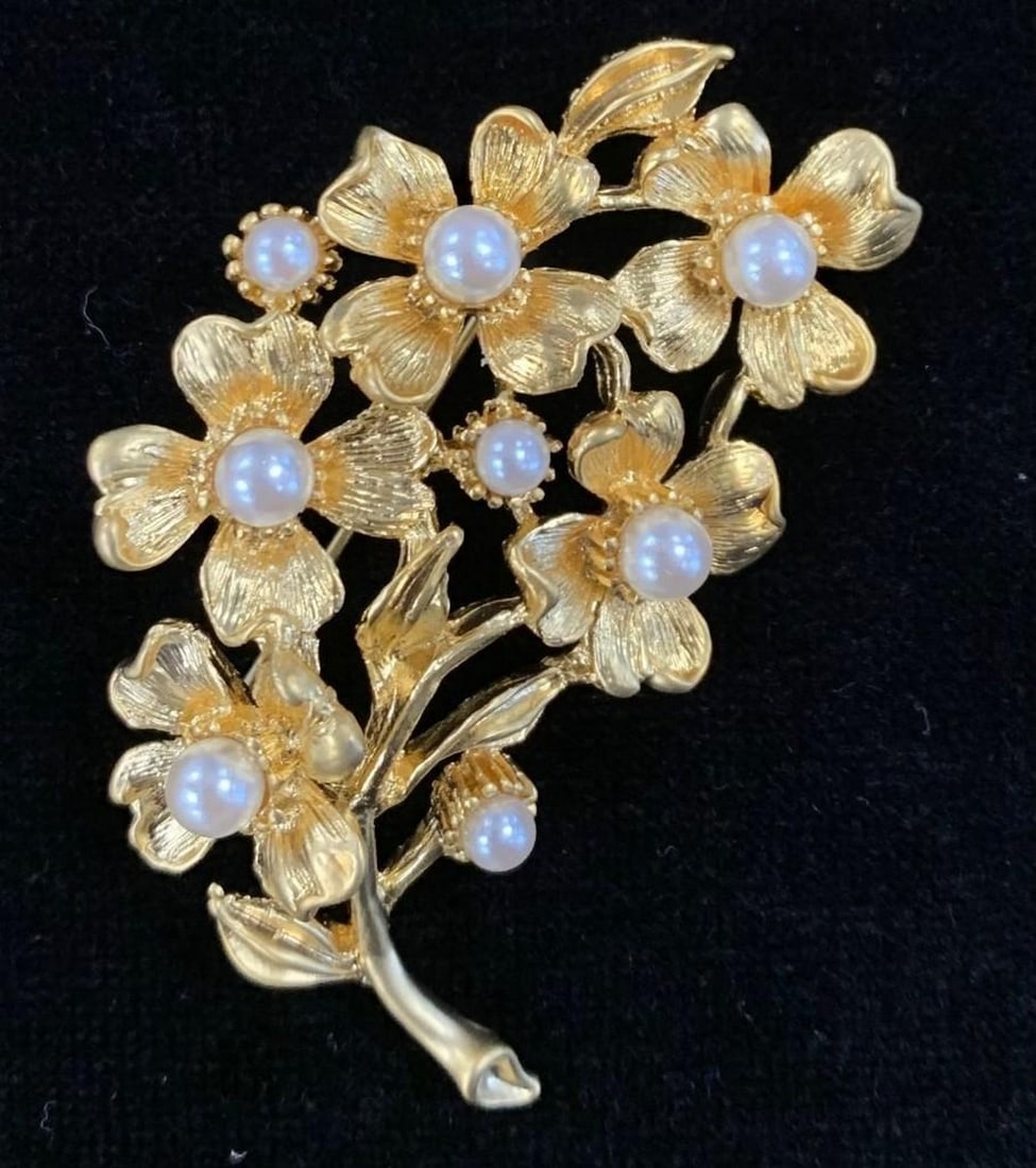 18KTGP Floral Brooch with Inlaid White Pearl Accents with Satin-Matte Gold Petals: 18KTGP Floral Brooch with Inlaid White Pearl Accents with Satin-Matte Gold Petals. White pearls are thought to symbolize innocence, new beginnings, beauty and sincerity. They have also been said to