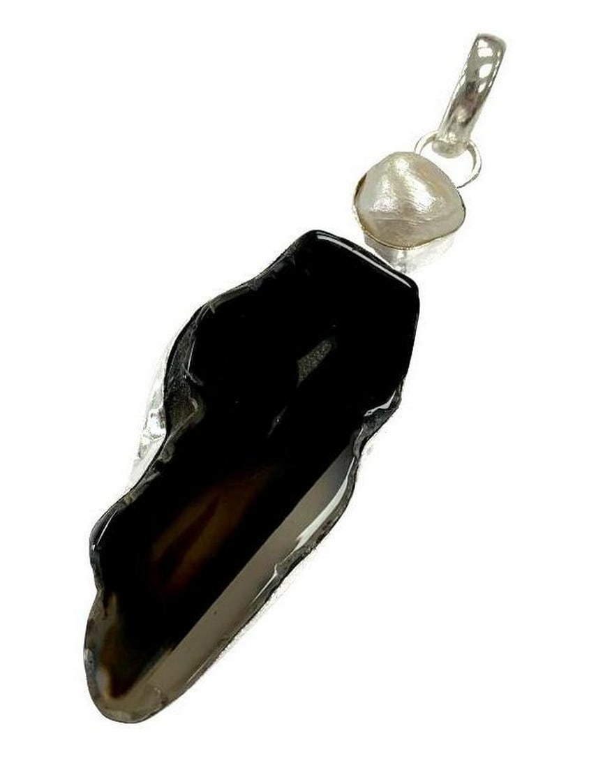 Freshwater Pearl With 3.1" Black Botswana Agate Pendant: Freshwater Pearl With 3.1" Black Botswana Agate Pendant Black Botswana Agate is said to give strength, emotional balance, & stability. It is also said to be the ultimate bringer of peace despite