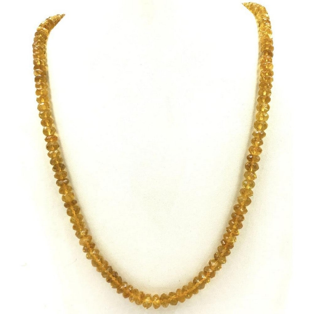 19" Treated Citrine Faceted String Bead Necklace: 19" Treated Citrine Faceted String Bead Necklace Citrine is associated with positivity and optimism, which is not surprising given its cheerful color. It's often used to assist in manifesting