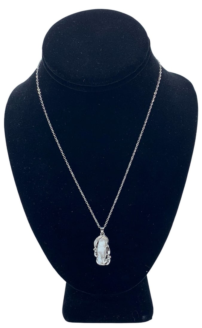 Natural White Luster Freshwater Biwa Pearl On Crystal Flower Pendant & Chain Necklace: Natural White Freshwater Biwa Pearl On Crystal Flower Pendant & Chain Necklace. The 12mm x 26mm Pink Luster Biwa Freshwater Pearl Is Encased In A Beautifully Crafter Crystal & Flower Pendant. The