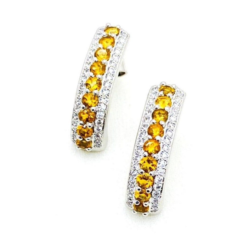 Zirconia Lined Citrine Stud Earrings: Zirconia Lined Citrine Stud Earrings These earrings feature a stripe of Citrine stones down the middle with a stripe of zirconia stones on each side. View Photos For Further Details.