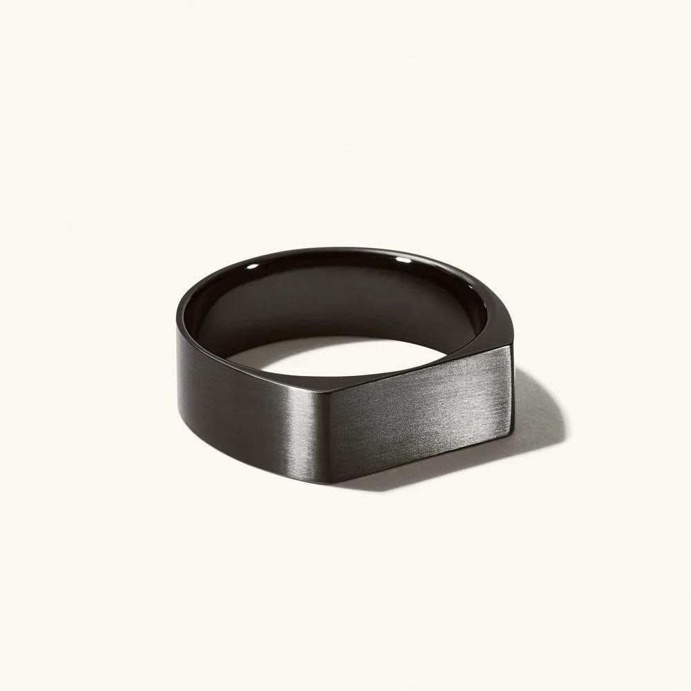 Sleek Rectangle Signet Titanium Ring: Sleek Rectangle Signet Titanium Ring Introducing the signet ring you know and love - now with added substance, because a bold agenda applies to your jewelry, too. Crafted from titanium, our strongest 