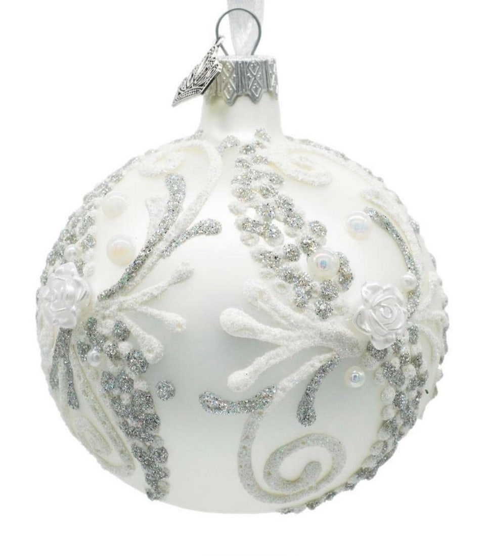 Sparkling Swirls and White Roses on a White Glass Ball Ornament: Sparkling Swirls and White Roses on a White Glass Ball Ornament Introducing our enchanting White Glass Christmas Ornament with Sparkling Swirls and White Roses - a timeless addition to your holiday