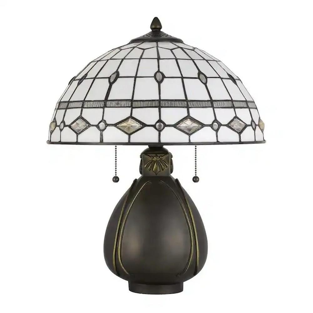 Art Nouveau Glass Inspired Tiffany Lamp: Art Nouveau Glass Inspired Tiffany Lamp Enhance your decor with this exquisite Tiffany-style table lamp, featuring a stunning diamond and oval glass pattern set on a dark bronze resin base. This timel
