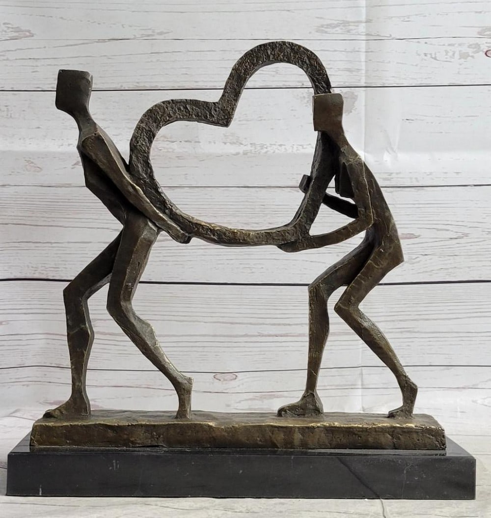 Signed Francisci Original Lovers Carrying Heart Bronze Sculpture: Signed Francisci Original Lovers Carrying Heart Bronze Sculpture This exquisite bronze sculpture captures the essence of love and togetherness with its depiction of an elegant and slender abstract cou