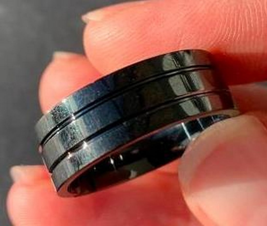 Black Men's Band Ring with Double Carved Lines: Black Men's Band Ring with Double Carved Lines Sleek, modern, and effortlessly stylish. This black men's ring features two clean carved lines running around the band, creating a subtle yet bold design