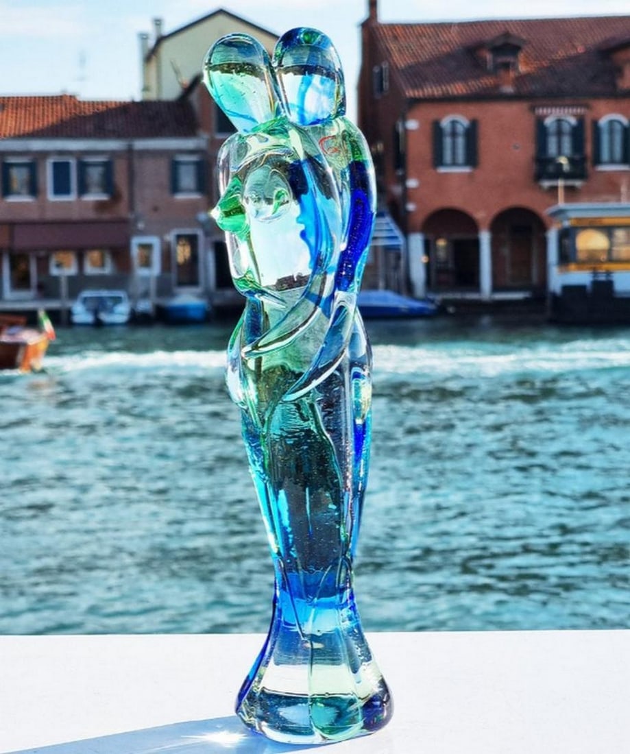 Lovers Sculpture OneLove - Light Blue Green - Murano Glass: Lovers Sculpture OneLove - Light Blue Green - Murano Glass Handmade in Murano using the warm glass modelling technique, this sculpture depicts two lovers in abstract form. Created in light blue and gr