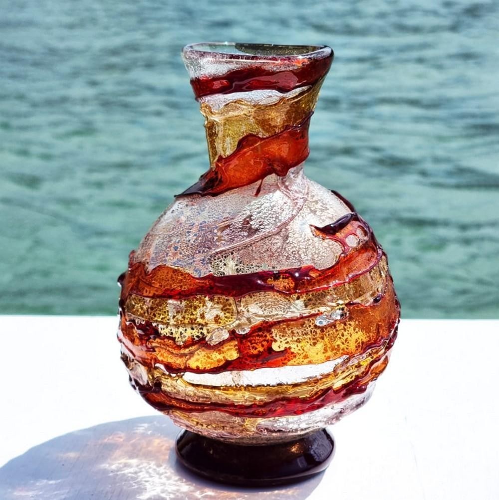 Murano Glass Vase in Red & Pink - Sbruffi Technique: Murano Glass Vase in Red & Pink - Sbruffi Technique Handmade blown vase crafted from colored glass with delicate silver accents. Renowned worldwide, Murano glass masters transform simple materials usi