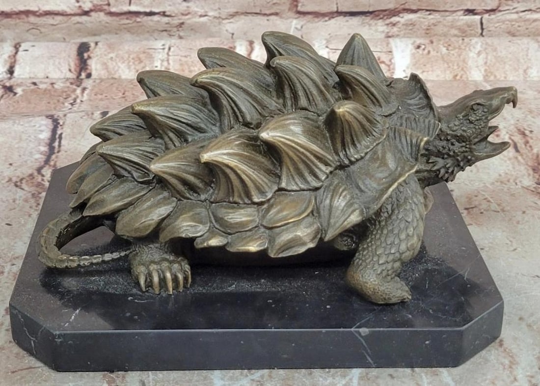 Milo Alligator Snapping Turtle Bronze Sculpture - 5" x 8.5": Milo Alligator Snapping Turtle Bronze Sculpture - 5" x 8.5" This original bronze sculpture by Milo captures the rugged strength and prehistoric character of an alligator snapping turtle. The d