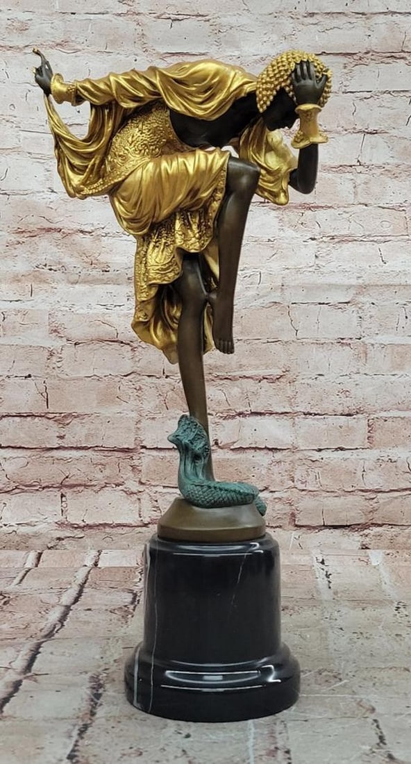 Ankara Dancer Bronze Sculpture Signed Schwalenberg - 17" x 9": Ankara Dancer Bronze Sculpture Signed Schwalenberg - 17" x 9" This expressive bronze and marble sculpture titled Ankara Dancer, signed Schwalenberg, captures the grace, rhythm, and elegance of