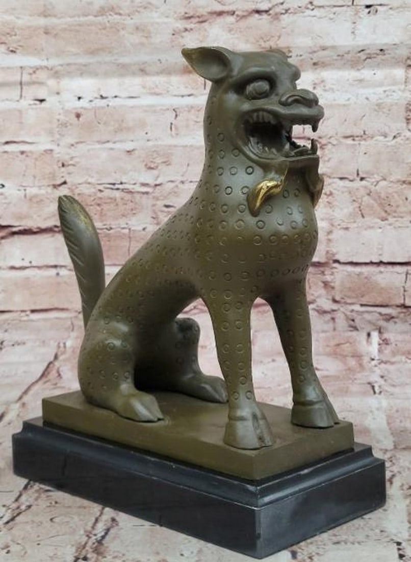 Guardian of Fortune: Bronze Seated Foo Dog Sculpture: Guardian of Fortune: Bronze Seated Foo Dog Sculpture This striking bronze sculpture, bearing the signature of the artist B.C. Zhang, features a seated Asian Foo Dog, also known as a guardian lion, ren