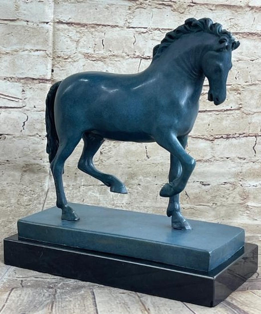 Bronze Horse with Green-Blue Patina: Bronze Horse with Green-Blue Patina Evoking the elegance of ancient China, this hot cast reproduction bronze sculpture, bearing the signature of the artist Barye, portrays a Tang-style horse mid-strid