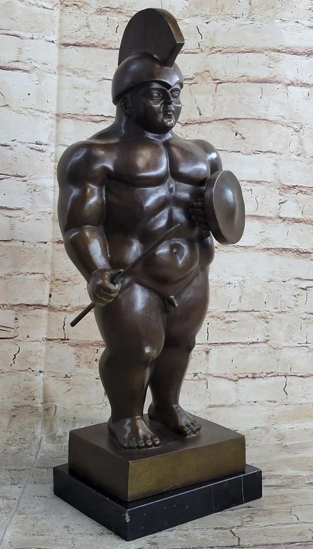 Boterismo Giant Roman Warrior Bronze Art Sculpture Inspired by F. Botero on Marble Base - 19" x 9": Boterismo Giant Roman Warrior Bronze Art Sculpture by Inspired F. Botero on Marble Base - 19" x 9" Enter a realm of ancient valor with this captivating bronze sculpture, capturing the spirit o