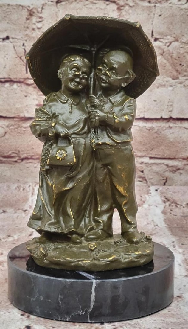 Under the Rain Bronze Sculpture by Cesaro - 8" x 4.5": Under the Rain Bronze Sculpture by Cesaro - 8" x 4.5" This exquisite bronze sculpture by Cesaro, titled Under the Rain, beautifully captures an elderly couple huddled together beneath a gentle