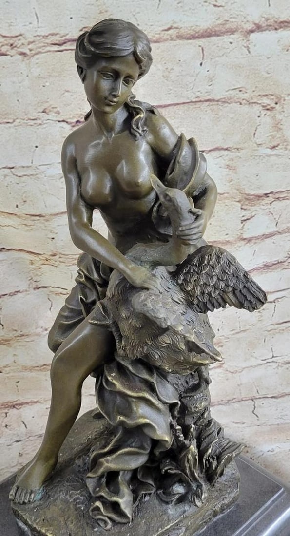 Leda and the Swan" Original Bronze Sculpture - 15.5" x 8.5: "Leda and the Swan" Original Bronze Sculpture - 15.5" x 8.5" Immerse yourself in Greek mythology with this captivating bronze sculpture of Leda and the Swan. The sculpture portrays Led