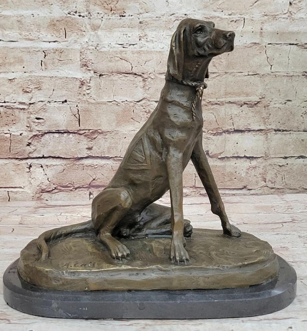 Inspired Bronze Vigilant Hound Sculpture - 10" x 10": Inspired Bronze Vigilant Hound Sculpture - 10" x 10" This striking bronze sculpture captures a golden-brown hound in a relaxed yet watchful pose, showcasing its sleek form, keen eyes, and grac