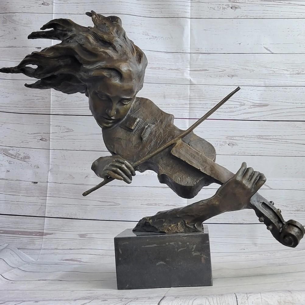 Female Fiddle Player Bust Original Bronze Statue - 23" x 31": Female Fiddle Player Bust Original Bronze Statue - 23" x 31" Immerse yourself in the world of music and art with this captivating bronze sculpture. The graceful figure of a woman, her hair flo