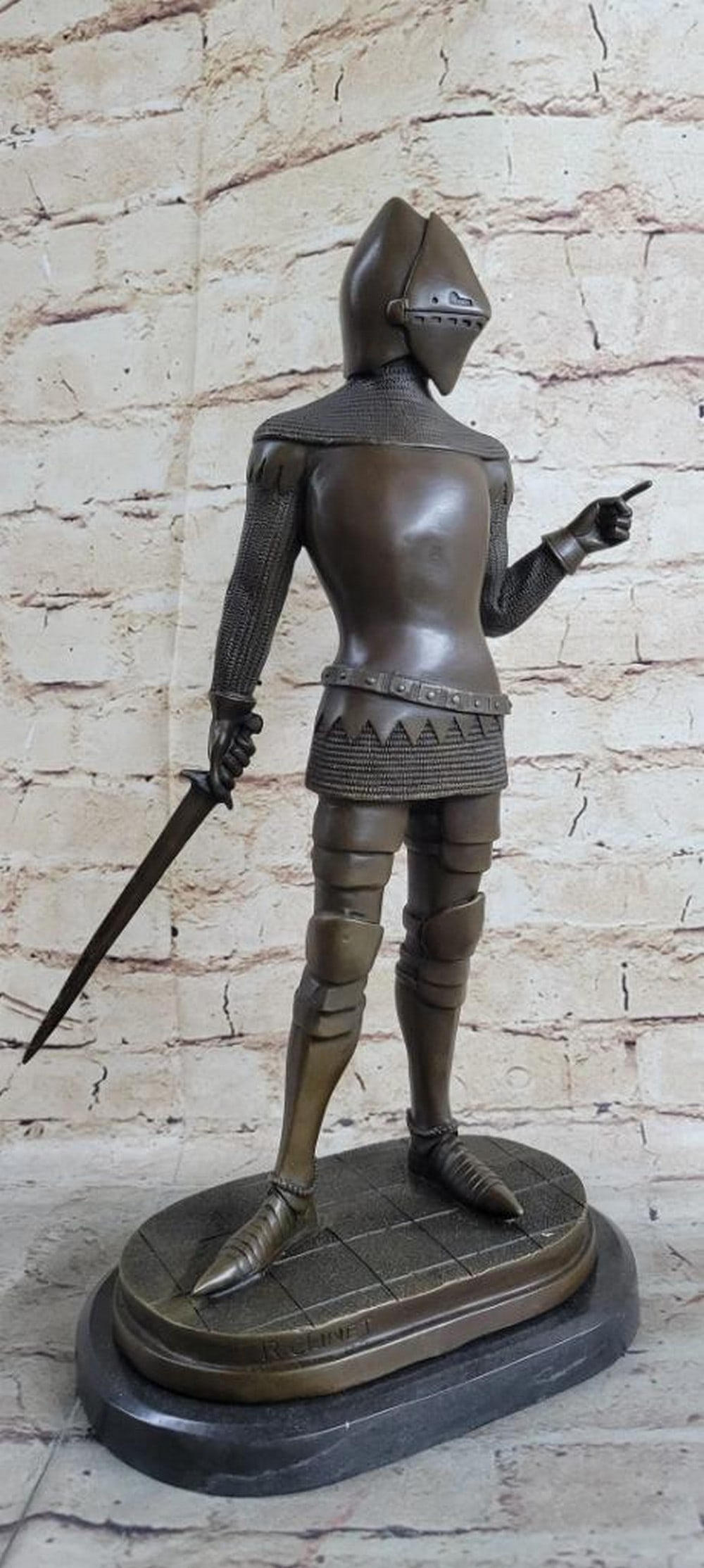 Regal Bronze Knight Sculpture by R. Clinet - 15.5" x 8": Regal Bronze Knight Sculpture by R. Clinet - 15.5" x 8" This exquisitely detailed bronze statue portrays a fully armored knight, standing tall with commanding presence and brandishing his swor