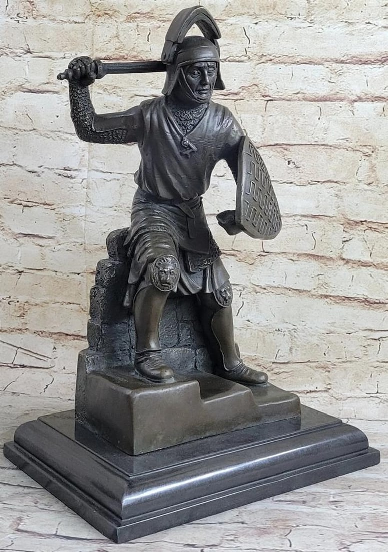 European Warrior Bronze Sculpture Original Kamiko - 17" x 10": European Warrior Bronze Sculpture Original Kamiko - 17" x 10" This striking bronze sculpture portrays a European warrior in a fierce fighting stance, ready to defend with his shield and sword.