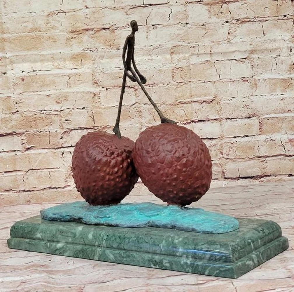 Giacometti's Tribute - Inspired Bronze Walking Strawberry Sculpture on Marble Base - 12" x 11.5": Giacometti's Tribute - Inspired Bronze Walking Strawberry Sculpture on Marble Base - 12" x 11.5" Immerse yourself in the artful fusion of nature and modernity with the "Walking Strawberry&