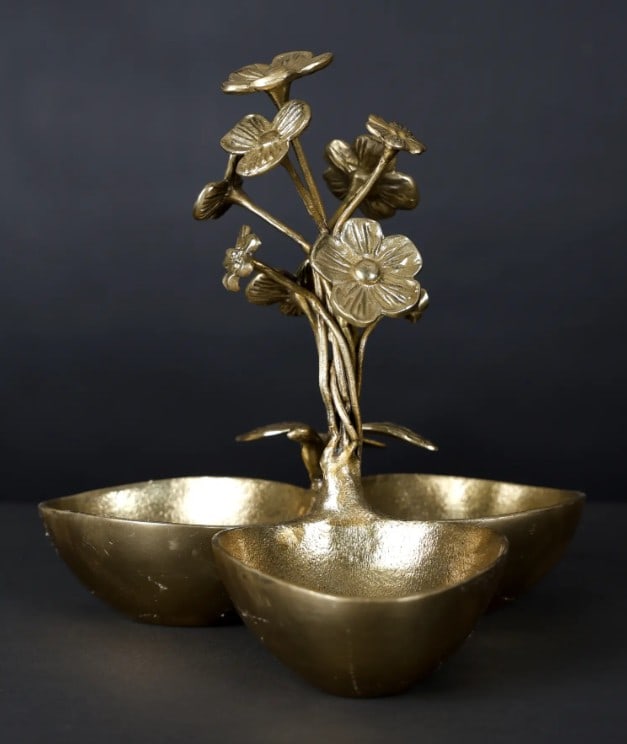 10'' Triple Bowl Urli with Floral Design - Elegant Brass Home Decor Accent: 10" Triple Bowl Urli with Floral Design - Elegant Brass Home Decor Accent At the heart of this brass urli, a beautifully detailed central flower blossoms-an ode to traditional craftsmanship. Yet, t