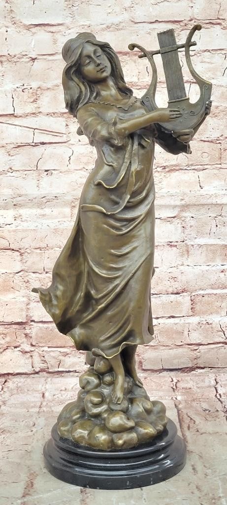 Harp Girl Figurine Bronze Statue by Vitaleh - 19'' x 6'': Harp Girl Figurine Bronze Statue by Vitaleh - 19" x 6" This elegant bronze sculpture depicts a female musician leaning into her harp, capturing grace, rhythm, and serene beauty. Handmade using t