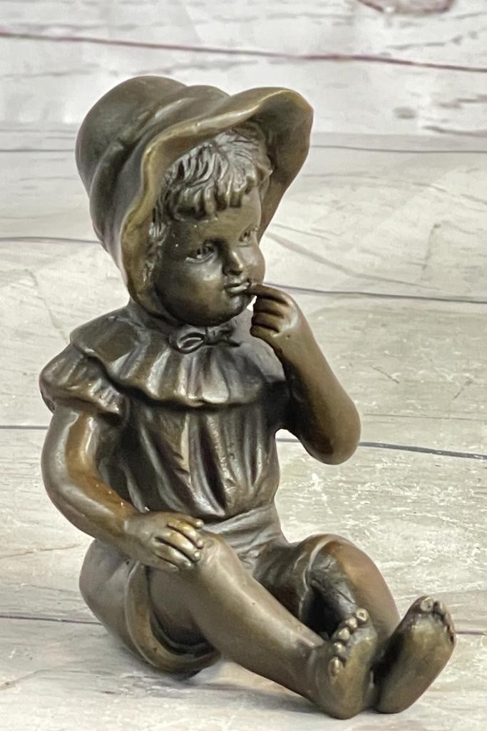 Original Youthful Baby Girl Bronze Sculpture: Original Youthful Baby Girl Bronze Sculpture Capture the innocence and charm of childhood with this exquisite bronze sculpture of a baby girl wearing a bonnet hat. Crafted with meticulous precision an