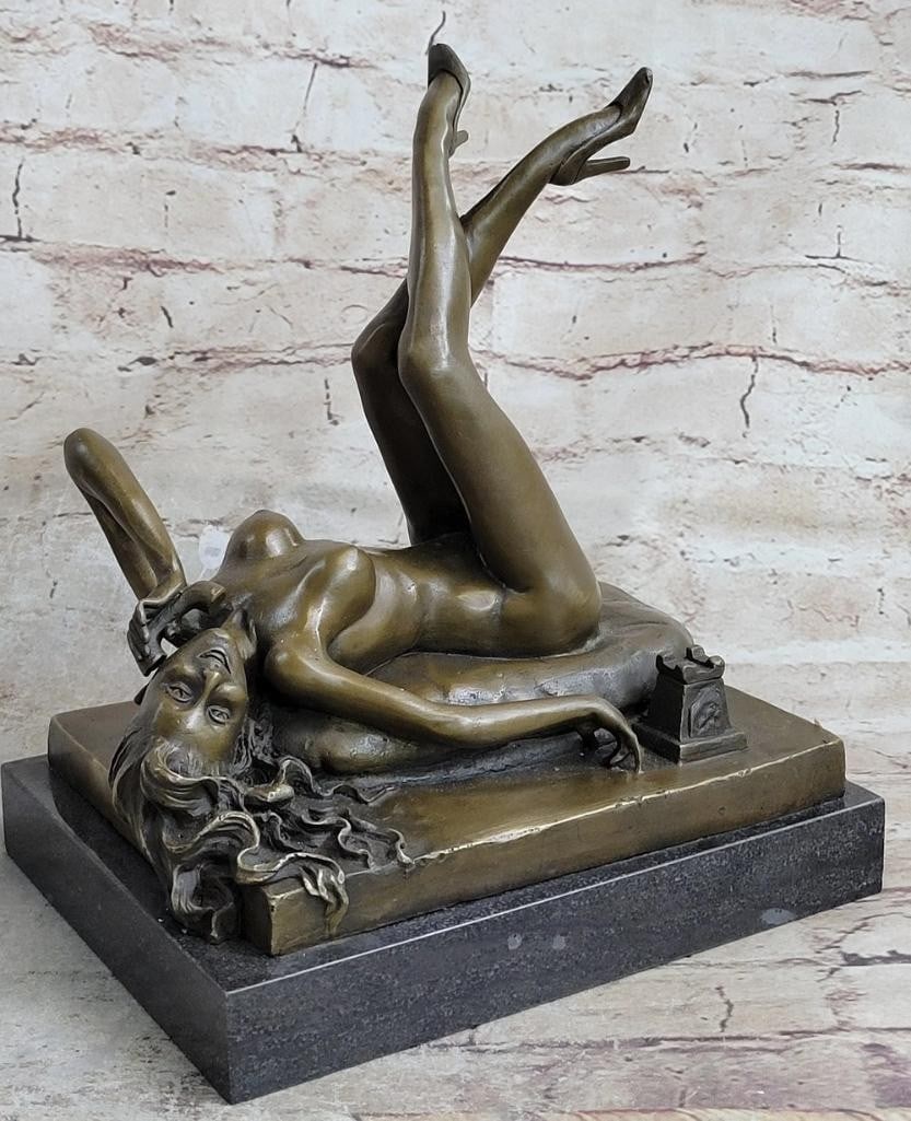 Inspired Nude Woman On Phone Bronze Sculpture - 10'' x 12'': Inspired Nude Woman On Phone Bronze Sculpture - 10" x 12" This pin-up Girl holds a phone while resting fully nude with certain sexy, provocative allure while maintaining that tasteful, classy lo