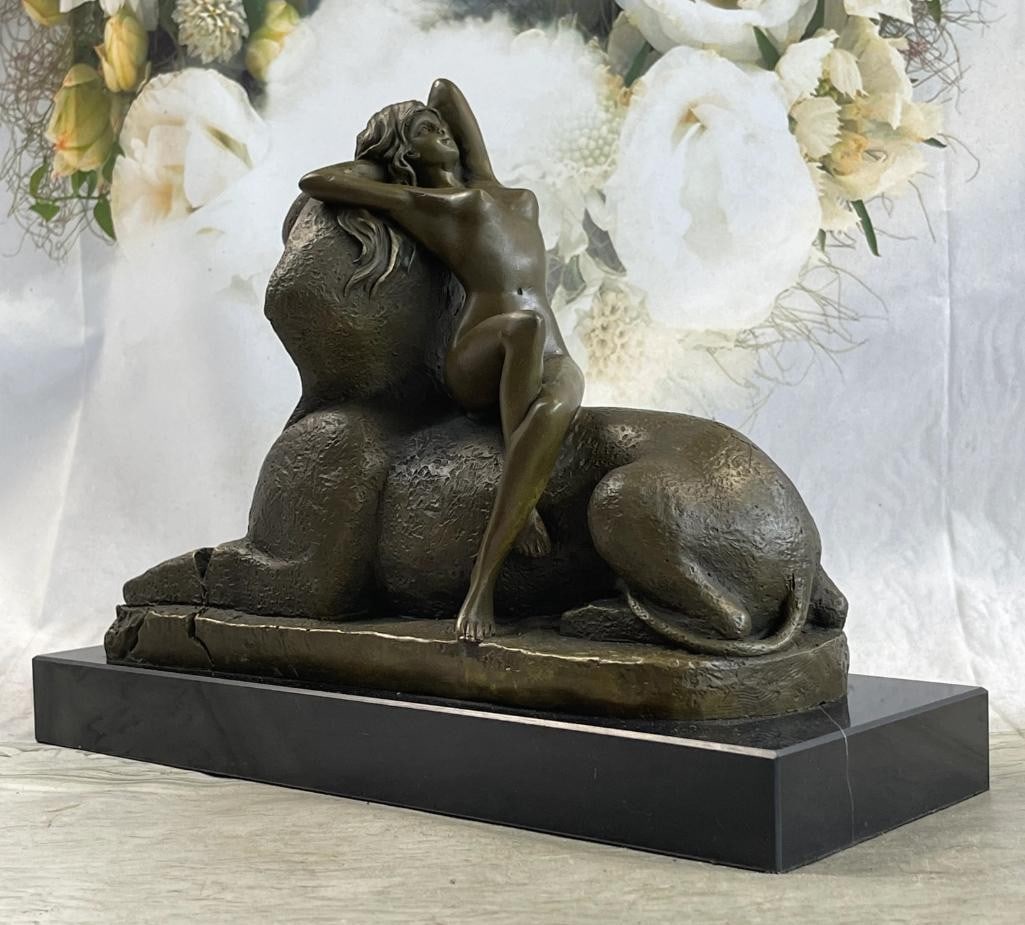 Inspired T. Herlinger Egyptian Sphinx w/ Nude Girl Art Deco Bronze Statue Sculpture 10'' x 12'': Inspired T. Herlinger Egyptian Sphinx w/ Nude Girl Art Deco Bronze Statue Sculpture 10" x 12" This Inspired T. Herlinger calls upon classical influences. This stunning work captures a languid be