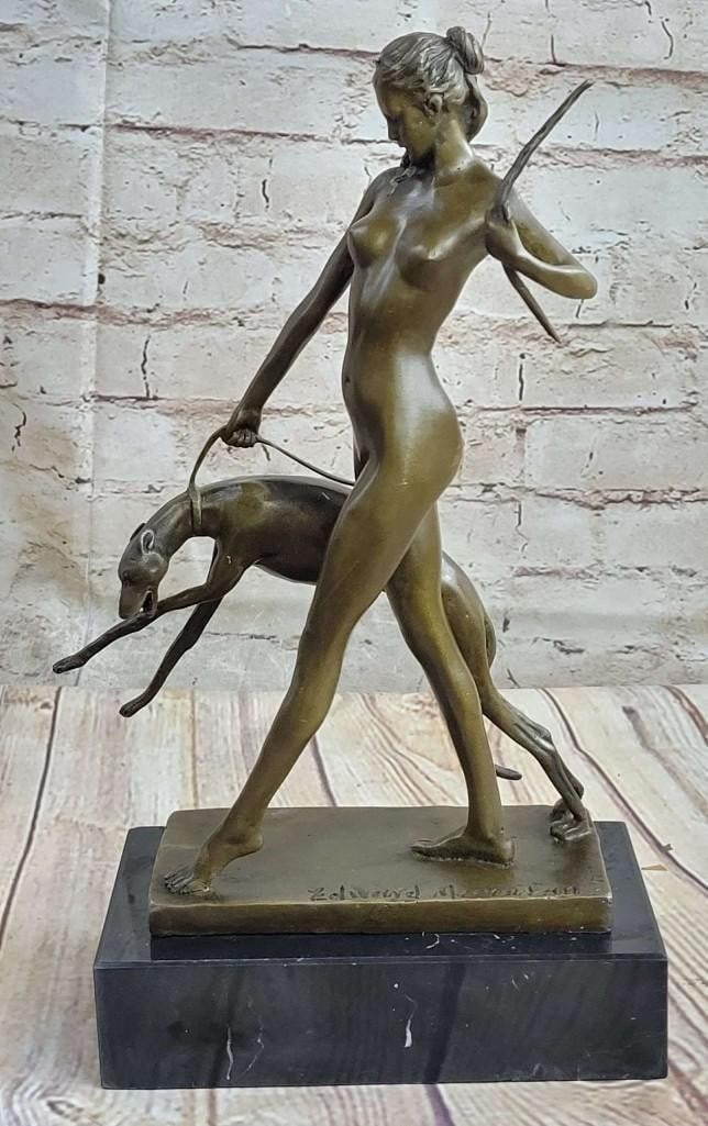 McCartain Inspired Diana The Hunter & Fierce Dog Bronze Sculpture- 12''x 9'': McCartain Inspired Diana The Hunter & Fierce Dog Bronze Sculpture- 12" x 9" Standing tall and nude this bronze sculpture of ''Diana the Hunter'' was handmade and casted using the ''Lost wax Meth