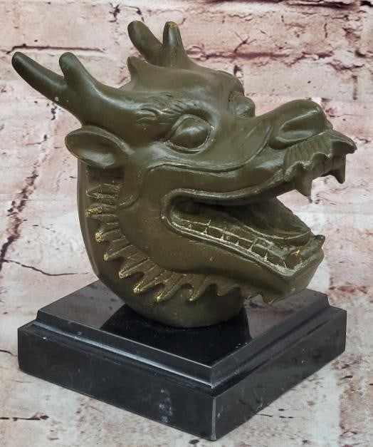 Mythic Charm: Smiling Bronze Dragon Head Bust: Mythic Charm: Smiling Bronze Dragon Head Bust Brimming with character and mystique, this bronze dragon head bust features a unique, smiling expression that blends the mythical with the whimsical. Expe