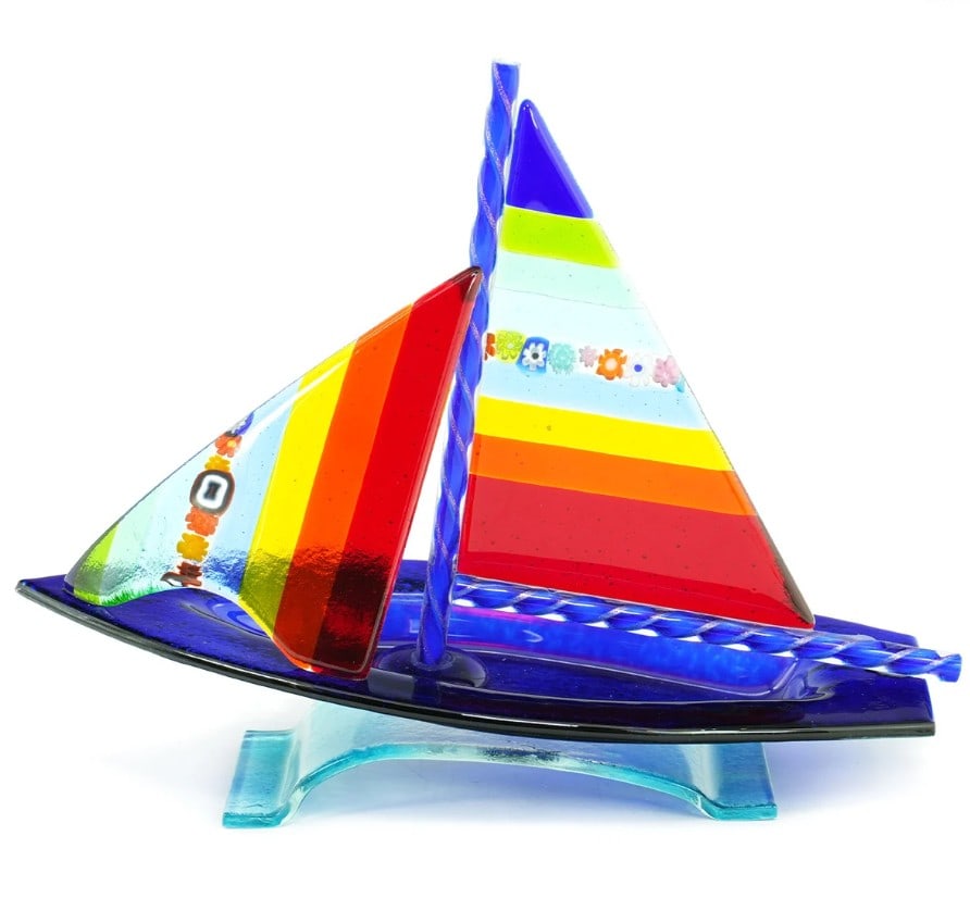 Mulitcolor Murano Glass Sailboat: Mulitcolor Murano Glass Sailboat Exclusive and unique glass artwork of sail boat handmade in colored glass realized with fusing glass technique. The sculpture is perfect to be used as a paperweight to