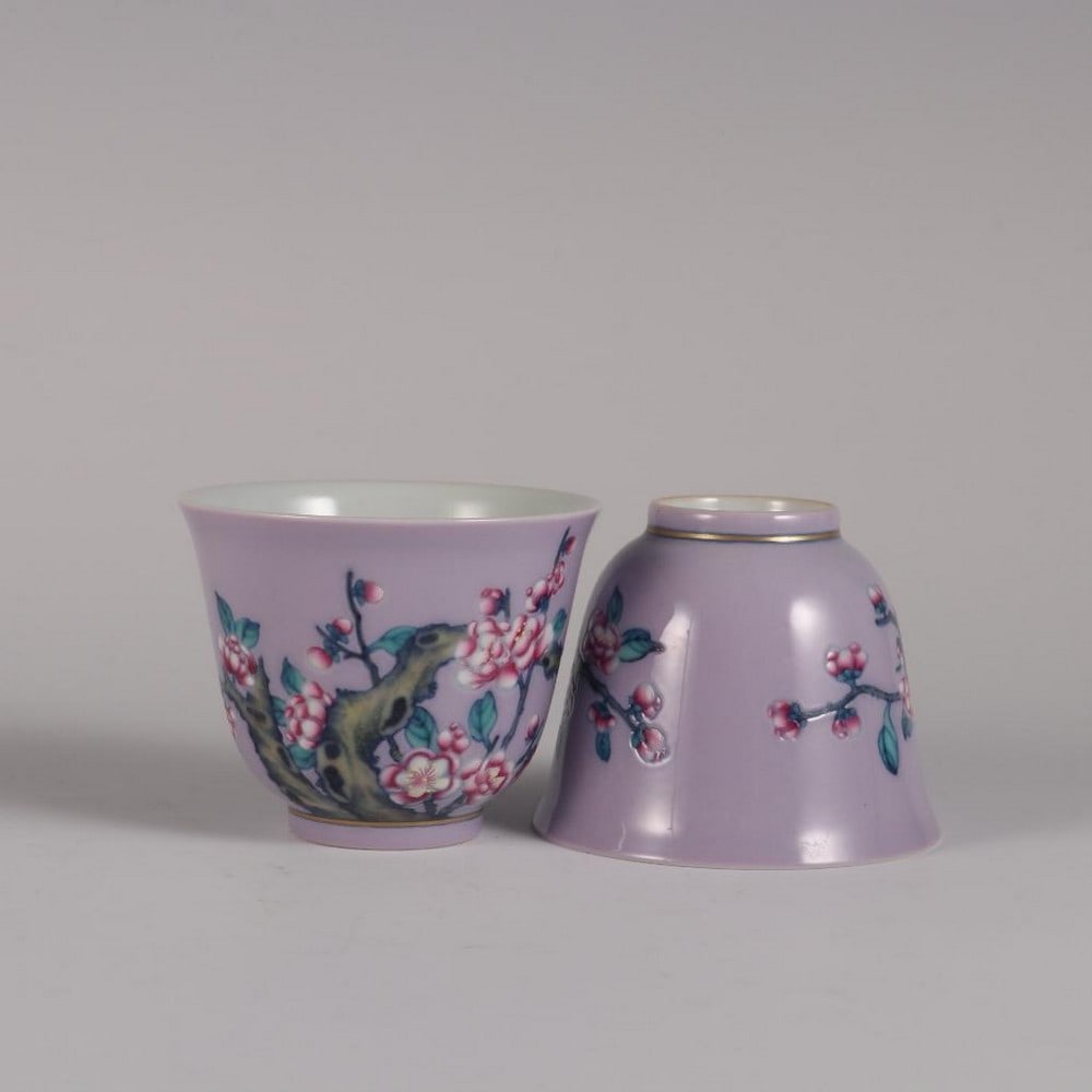 Qing Yongzheng Inspired Pink Glaze Bell Cup Pair: Qing Yongzheng Inspired Pink Glaze Bell Cup Pair Inspired by the delicate refinement of the Qing Dynasty Yongzheng period, this elegant pair of bell-shaped cups radiates serene beauty and balance. Eac