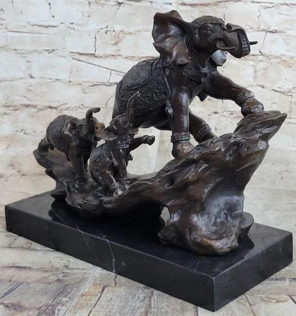 Painted Indian Elephant Inspired Bronze Statue - 10" X 12": Painted Indian Elephant Inspired Bronze Statue - 10" X 12" Adorned with ornate saddles, a mother elephant and her calves traverse India's grasslands in search of a watering hole. With raised t