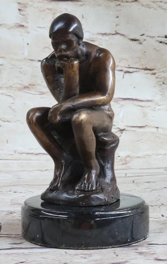 The Thinking Man Inspired Bronze Statue - 6" x 4": The Thinking Man Inspired Bronze Statue - 6" x 4" This bronze sculpture pays tribute to Auguste Rodin's renowned masterpiece, The Thinker. Originally conceived as The Poet, Rodin initially env