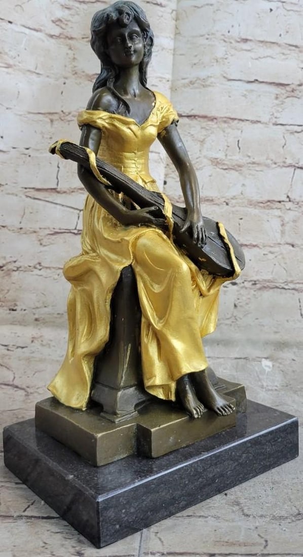 Banjo Playing Musician Bronze Sculpture: Banjo Playing Musician Bronze Sculpture A lonely maiden waits for her beau with her banjo in her lap. She cradles the guitar and gazes into the distance, her heart leaping with every passing shadow. A