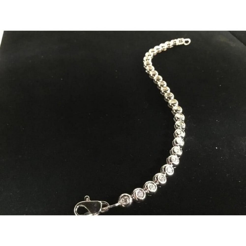 Custom Made 18K Solid White Gold Ladies Bracelet with 2.2ct Diamonds: An Exquisite 18K Solid White Gold Woman's Bracelet With 2.2ct of Inset Diamonds (VS,F2G,Good). A flag ship of Italian Craftsmanship for ladies fashion and apparel. This Bracelet is favorite in custom
