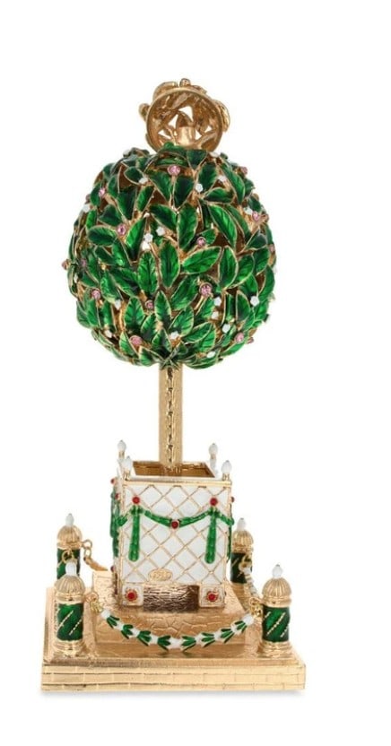 1911 Royal Russian Inspired Egg - Bay Tree: 1911 Royal Russian Inspired Egg - Bay Tree Youll love the elegance of this green-hued, 1911 Bay Tree Easter egg. This sparkling figurine is adorned with crystals and high-polished enamel with golden t