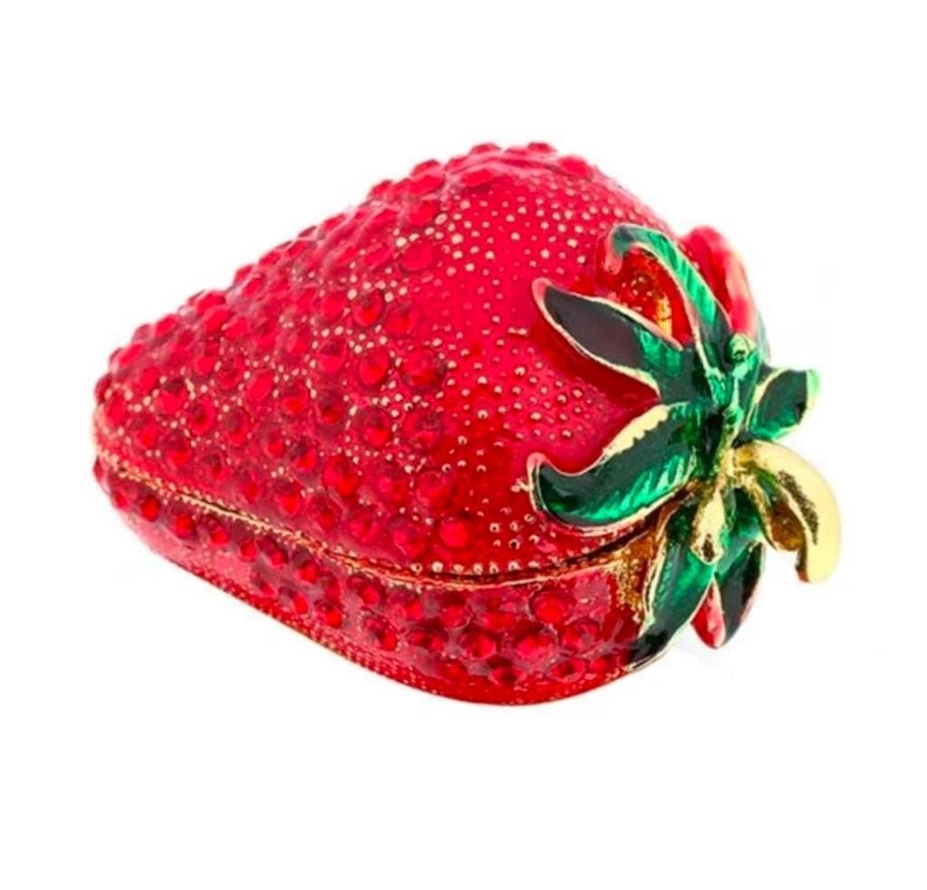 Sweet Red Enameled Strawberry Trinket Box: Sweet Red Enameled Strawberry Trinket Box This trinket box is not just a storage solution its a work of art and a celebration of natures sweetness. Crafted with meticulous attention to detail, the ext