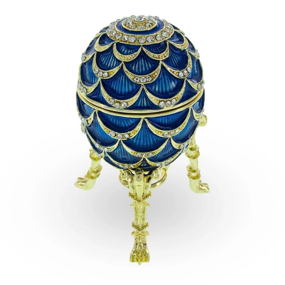 Royal Pinecone Blue Enamel Imperial Easter Egg with Timepiece: Royal Pinecone Blue Enamel Imperial Easter Egg with Timepiece This exquisite gold-plated pewter egg, adorned with sparkling Austrian crystals and delicate enamel work, is openable and features a clock