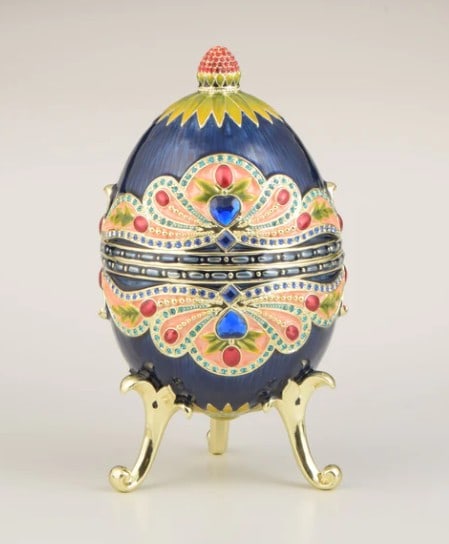 Russian-Inspired Blue Egg: Russian-Inspired Blue Egg Embark on a journey of cultural opulence with our Russian-Inspired Blue Egg, a captivating masterpiece plated with 24K Gold. Meticulously crafted with inspiration from tradit